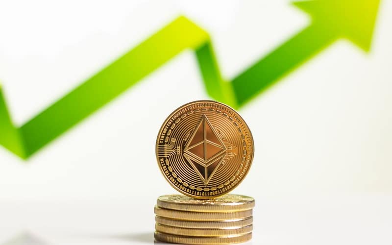 Stacked Ethereum coins with upward arrow indicating growth in digital currency market.