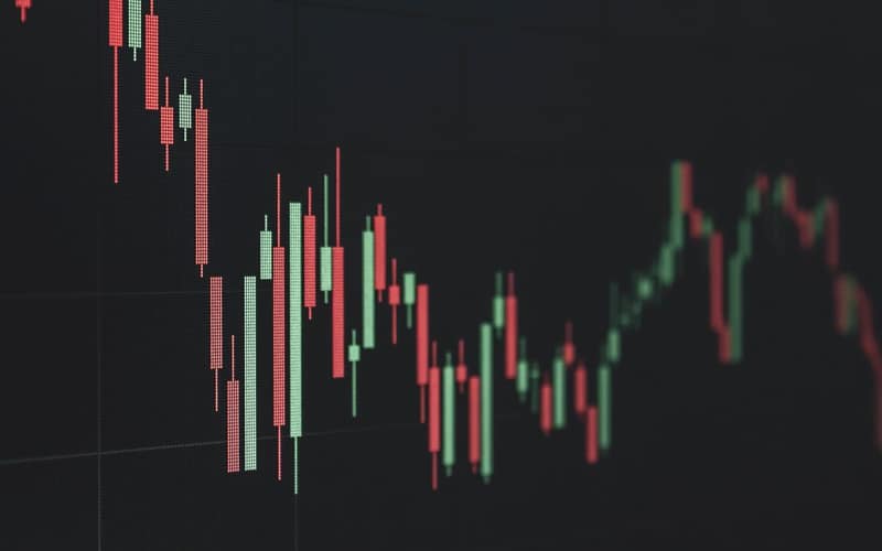 Stock market data chart showing trends in red and green. Perfect for financial and business themes.