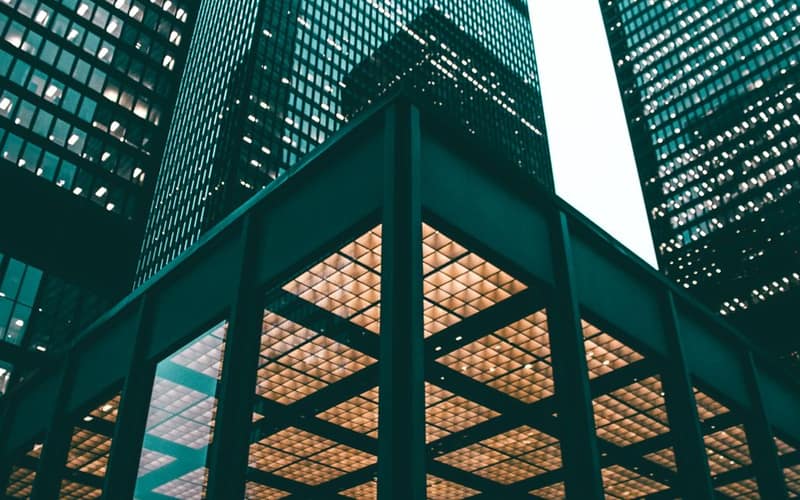 Low angle view of Toronto high-rises showcasing modern architectural design during daytime.