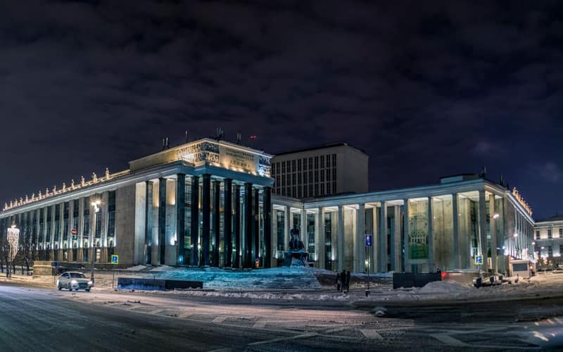 Stunning night scene of illuminated architectural landmark in Ust'-Kamenogorsk, Kazakhstan.