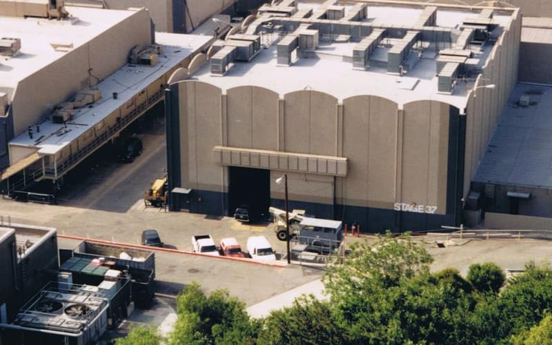 A high angle view of industrial buildings with rooftops in Los Angeles, CA.